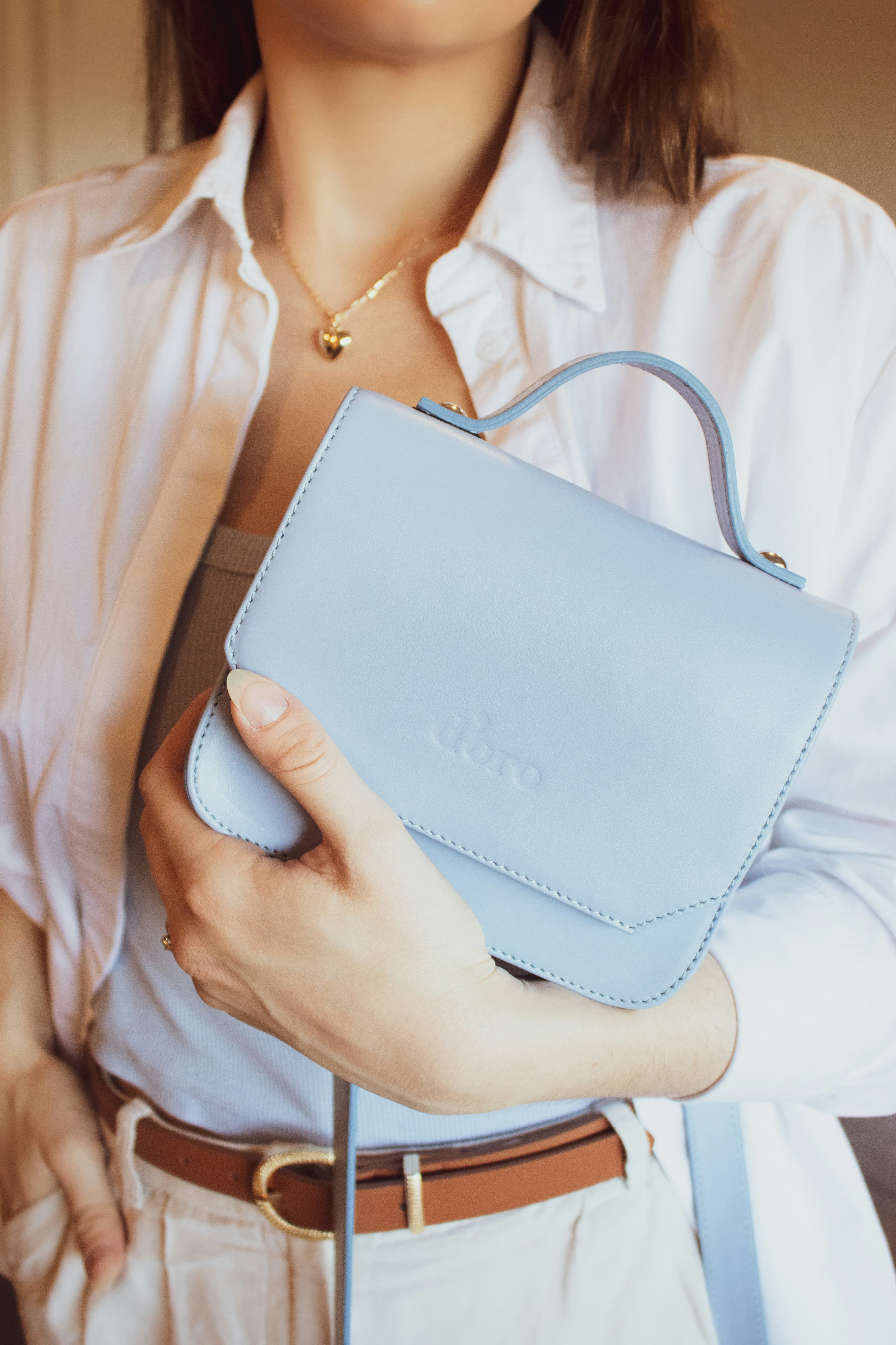 Join Chitose+ — model holding mint green Lady Dior handbag